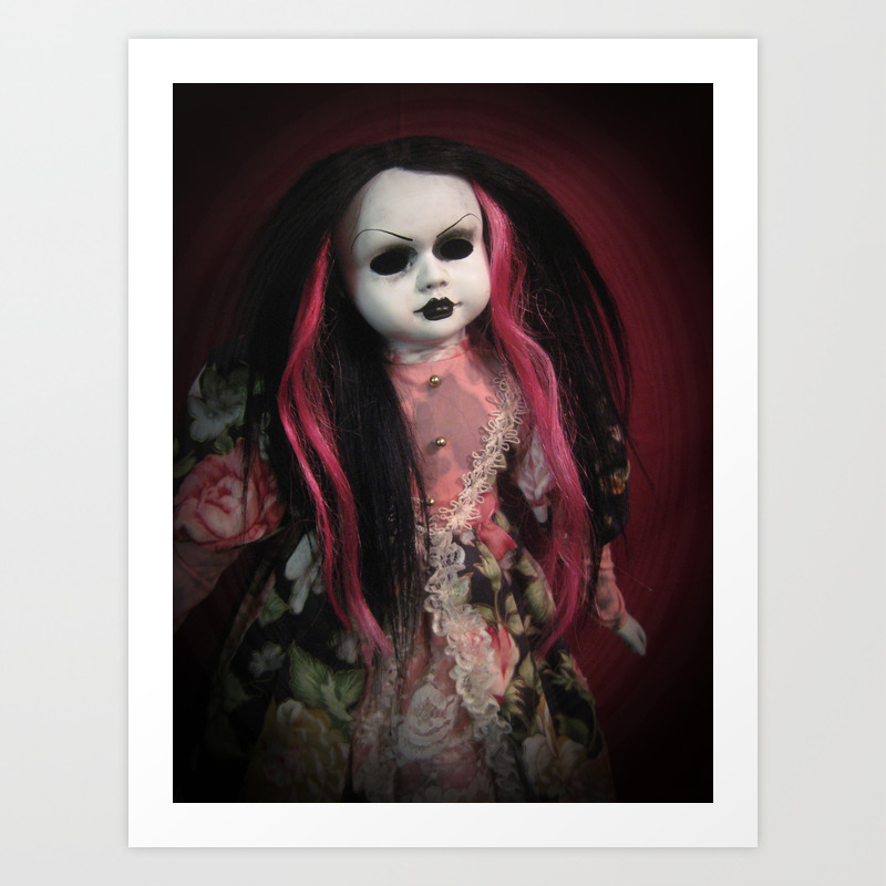 creepy girl with black hair and doll