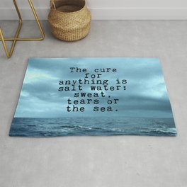 The cure for anything is salt water Rug