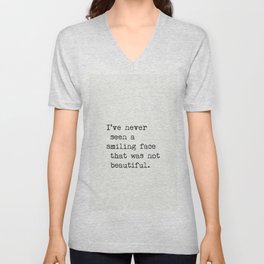 I’ve never seen a smiling face that was not beautiful. Unisex V-Neck