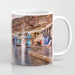 Sunset at the fishermen houses with the impressive boat shelters, also known as “syrmata” in Klima of Milos, Greece Coffee Mug