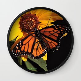 Monarch on a Desert Sunflower Wall Clock