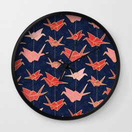 Red origami cranes on navy blue Wall Clock
