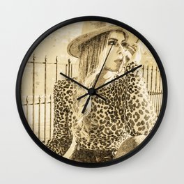 Woman In Brown And Black Leopard Long Sleeve Shirt And Blue Denim Jeans Sitting On Brown Wall Clock