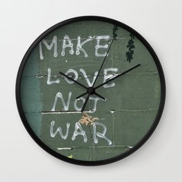 Make love not war Wall Clock