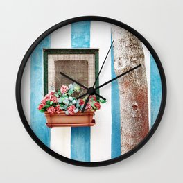 Mediterranean window with colorful flowers Wall Clock